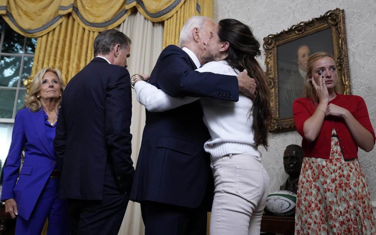 Biden hugs emotional family members after addressing the nation