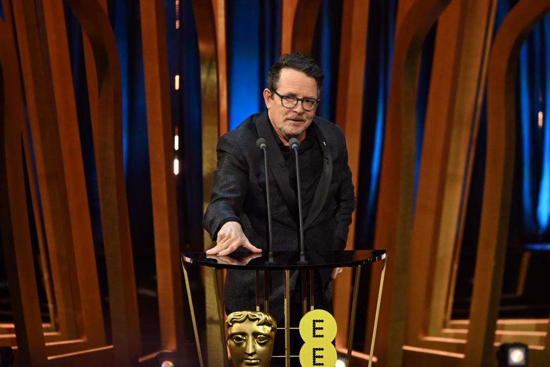 LONDON, ENGLAND - FEBRUARY 18: Michael J Fox presents the Best Film Award on stage during the EE BAFTA Film Awards 2024 at The Royal Festival Hall on February 18, 2024 in London, England. (Photo by Kate Green/BAFTA/Getty Images for BAFTA)