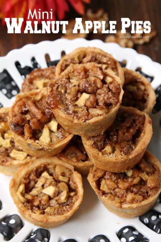 <p>Snappy Gourmet</p><p>Mini walnut apple pies, an easy recipe for mini apple pies loaded with crunchy walnuts that is perfect for Thanksgiving dessert and holiday parties.</p><p><strong>Get the recipe: <a href="https://snappygourmet.com/mini-walnut-apple-pies/" rel="nofollow noopener" target="_blank" data-ylk="slk:Mini Walnut Apple Pies;elm:context_link;itc:0;sec:content-canvas" class="link rapid-noclick-resp">Mini Walnut Apple Pies</a></strong></p>