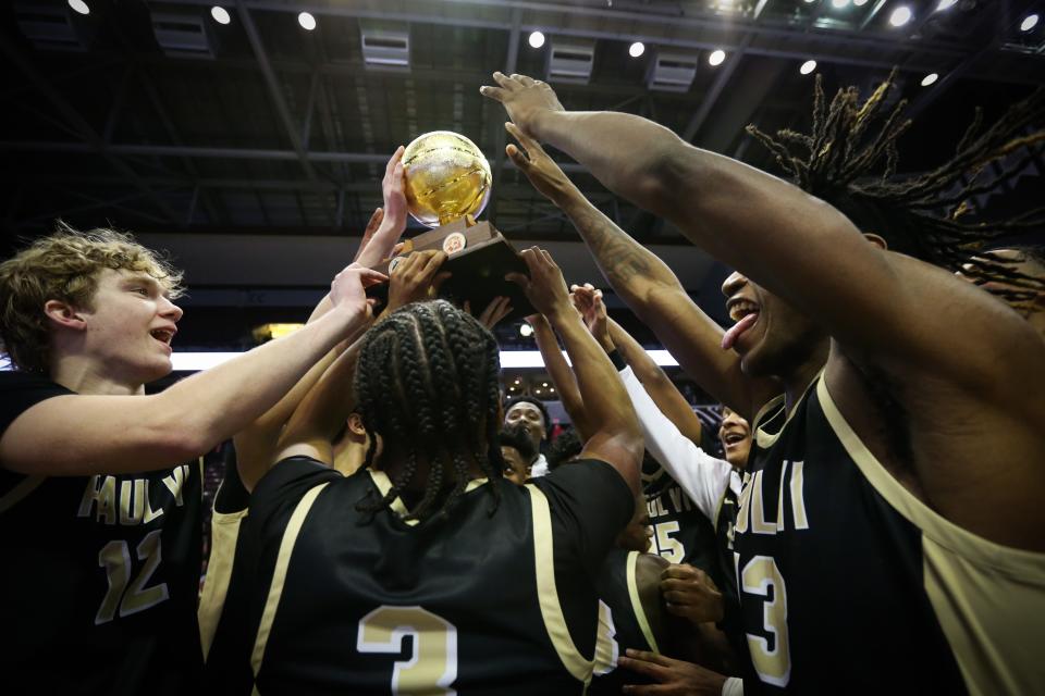 The Paul VI Catholic Panthers (Virginia) celebrate winning the 39th annual Tournament of Champions at Great Southern Bank Arena on Saturday, Jan. 13, 2024. The Panthers (Virginia) beat the St. John Bosco Braves (California) 71-53.