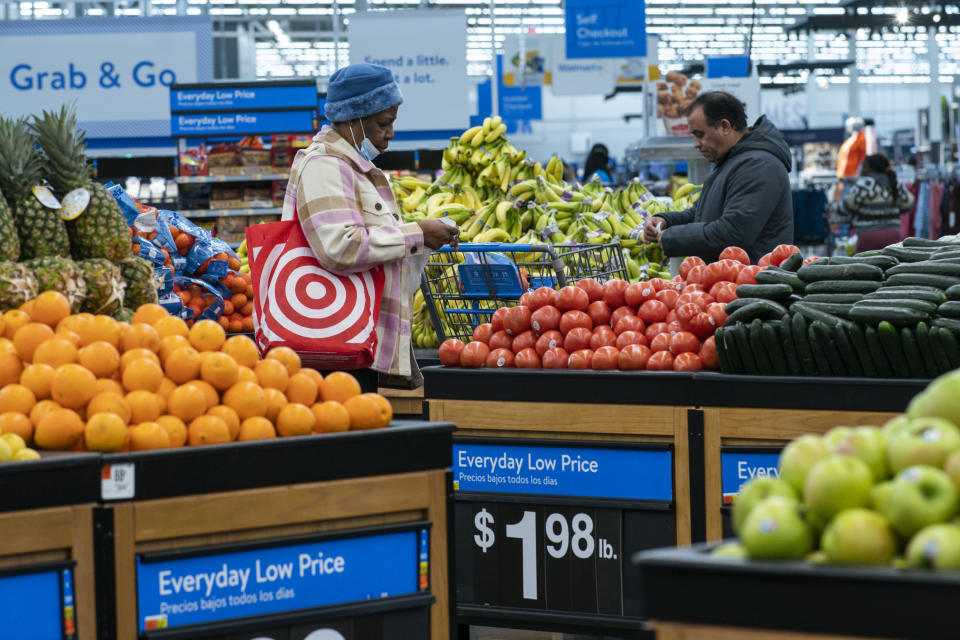 Customers shop for vegetables inside the Walmart Supercenter in North Bergen, Thursday, February 9, 2023, in New Jersey.  (AP Photo/Eduardo Muñoz Álvarez)