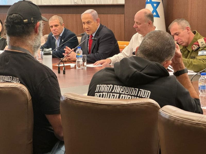Israeli Prime Minister Benjamin Netanyahu meets with representatives of the hostages' families, at the Prime Minister's Office. Prime Minister's Media Dept/GPO/dpa