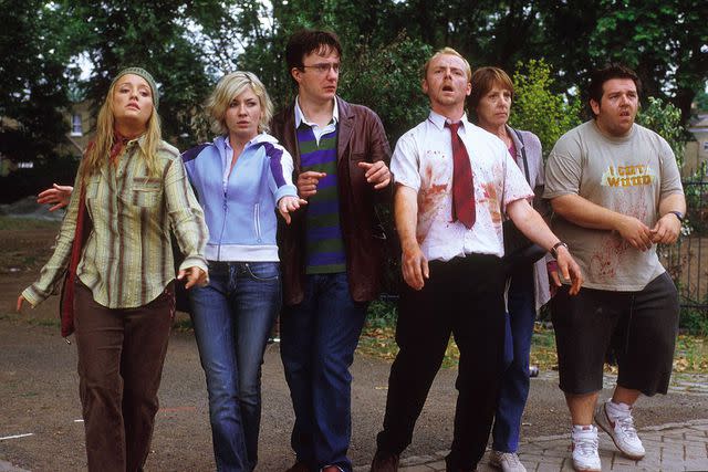 <p>Big Talk/Kobal/Shutterstock</p> Lucy Davis, Kate Ashfield, Dylan Moran, Simon Pegg, Penelope Wilton and Nick Frost in 2004's Shaun of the Dead