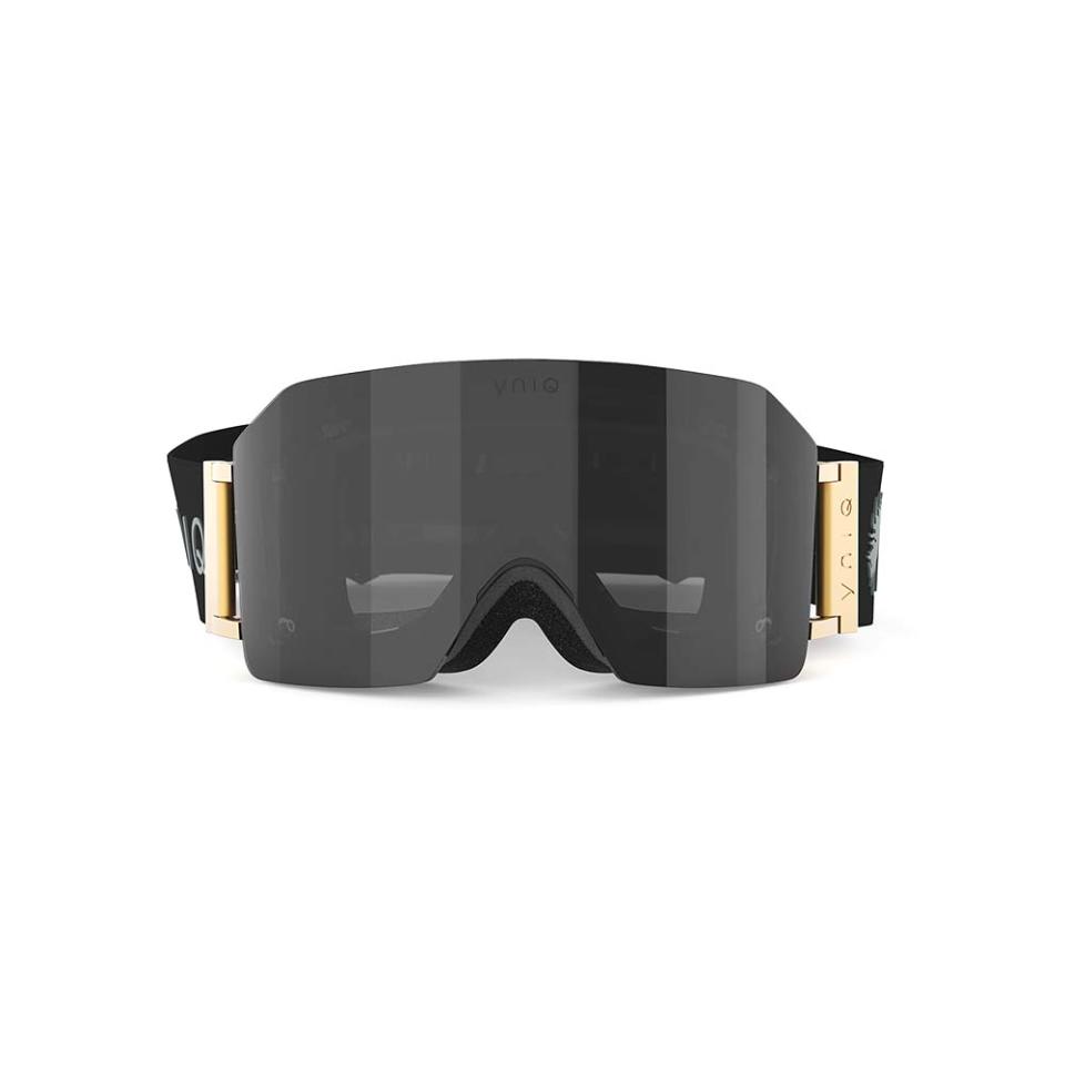 During an Aspen outing last December, Justin Bieber completed his Perfect Moment snowboarding look with Model Nine ski goggles in Black Gold; each pair comes with two lenses in light and dark tints that can easily be swapped out with magnetic technology; $660, yniq-usa.com