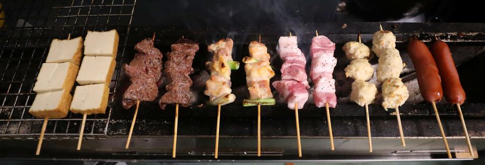 Various yakitori fill the charcoal grill at Oishi Japanese Kitchen in Bremerton on Monday, Nov. 20, 2023.