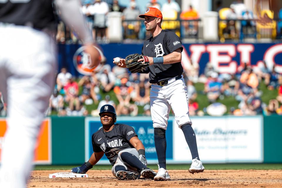 Yankees right fielder Oscar Gonzalez steals second base against Tigers shortstop Ryan Kreidler during the second inning of the Grapefruit League season opener at Joker Marchant Stadium in Lakeland, Florida, on Saturday, Feb. 24, 2024.