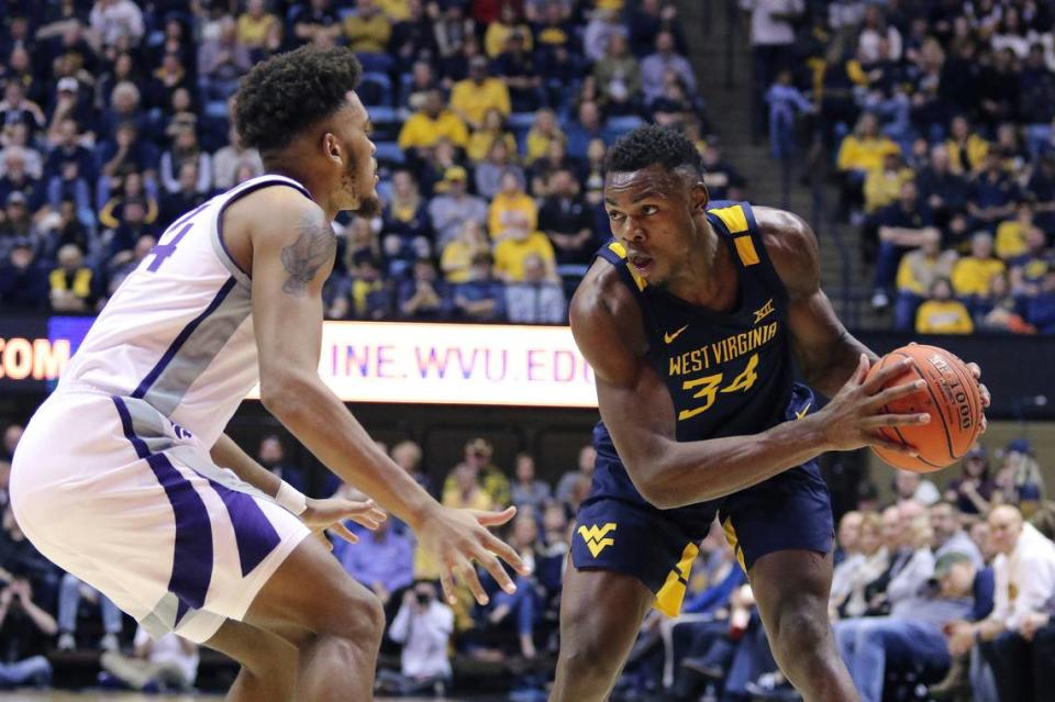 Oscar Tshiebwe, right, averaged 11.2 points and 9.3 rebounds in 23.2 minutes per game as a freshman at West Virginia last season. This past season, in the 10 games he played before transferring, Tshiebwe averaged 8.5 points and 7.8 rebounds in 19.9 minutes.