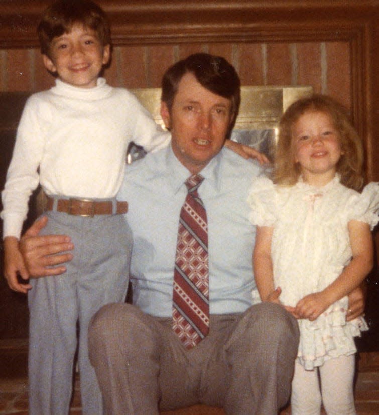 Matthew Paul Turner, left, with his dad, Virgil Turner, and his sister, Elisabeth, on Father's Day morning before the family went to church in 1979.