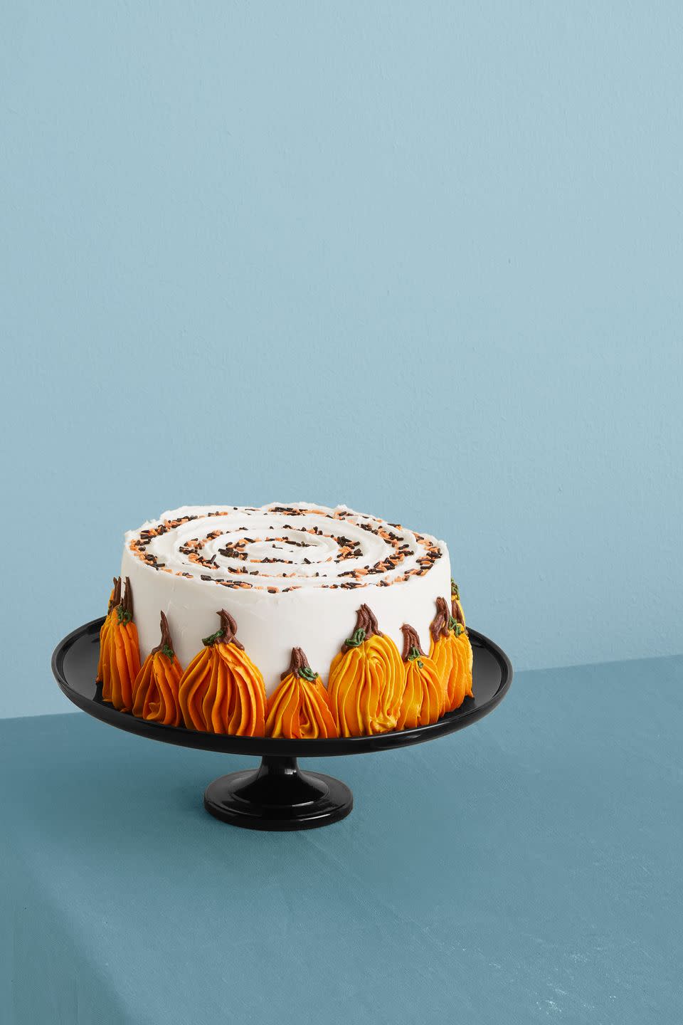 <p>If you have a knack for decoration, then you'll love tackling icing pumpkins on this fall-flavored cake.</p><p>Get the <strong><a href="https://www.womansday.com/food-recipes/a33564114/pumpkin-chocolate-chip-cake-recioe/" rel="nofollow noopener" target="_blank" data-ylk="slk:Pumpkin Chocolate Chip Cake recipe;elm:context_link;itc:0;sec:content-canvas" class="link ">Pumpkin Chocolate Chip Cake recipe</a></strong>.</p>