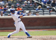 New York Mets' J.D. Davis hits a single against the Seattle Mariners during the fourth inning of a baseball game Sunday, May 15, 2022, in New York. (AP Photo/Noah K. Murray)