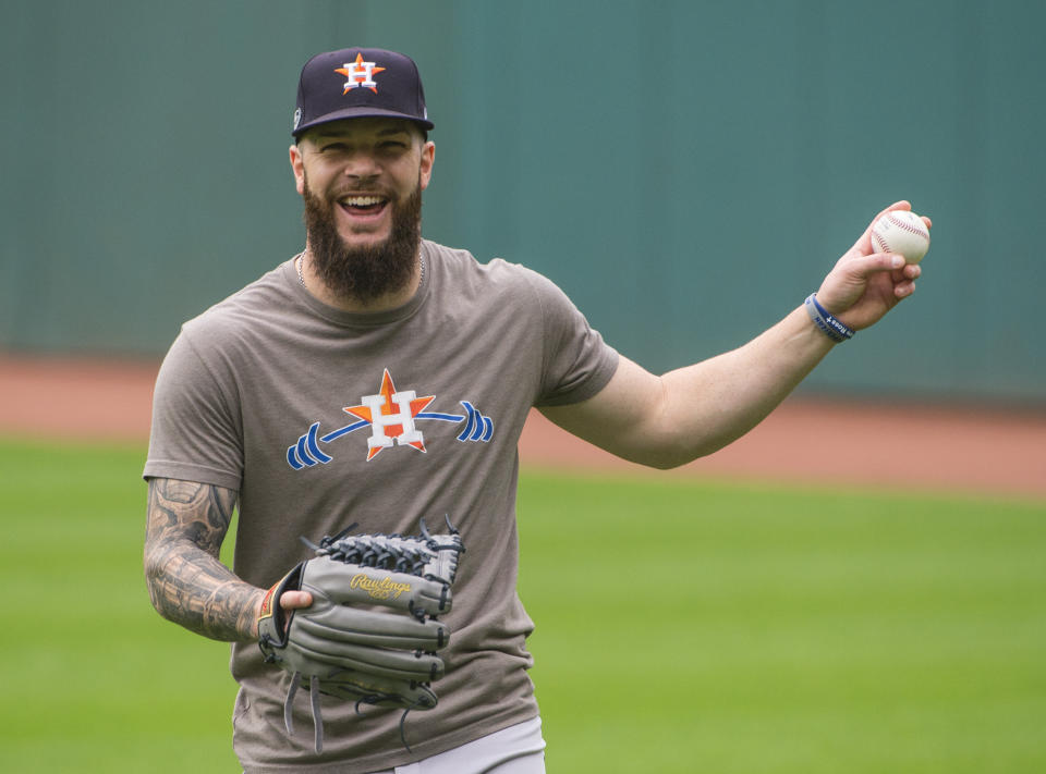 Houston Astros starting pitcher Dallas Keuchel throws during a workout in Cleveland, Sunday, Oct. 7, 2018. Keuchel is scheduled start against the Cleveland Indians in the third game of their ALDS series, Monday. (AP Photo/Phil Long)