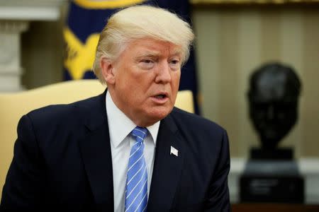 U.S. President Donald Trump delivers remarks to reporters during his meeting with Ukraine's President Petro Poroshenko in the Oval Office at the White House in Washington, U.S. June 20, 2017. REUTERS/Jonathan Ernst