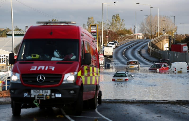 Cars sit in floodwater in the centre of Rotherham, near Sheffield