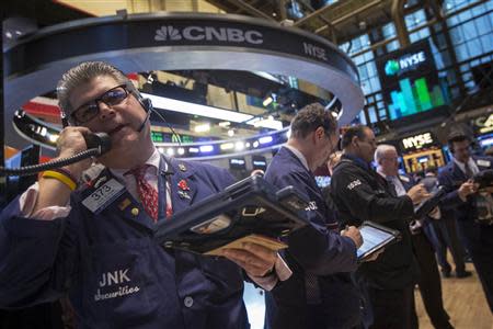 Traders work on the floor of the New York Stock Exchange April 3, 2014. REUTERS/Brendan McDermid