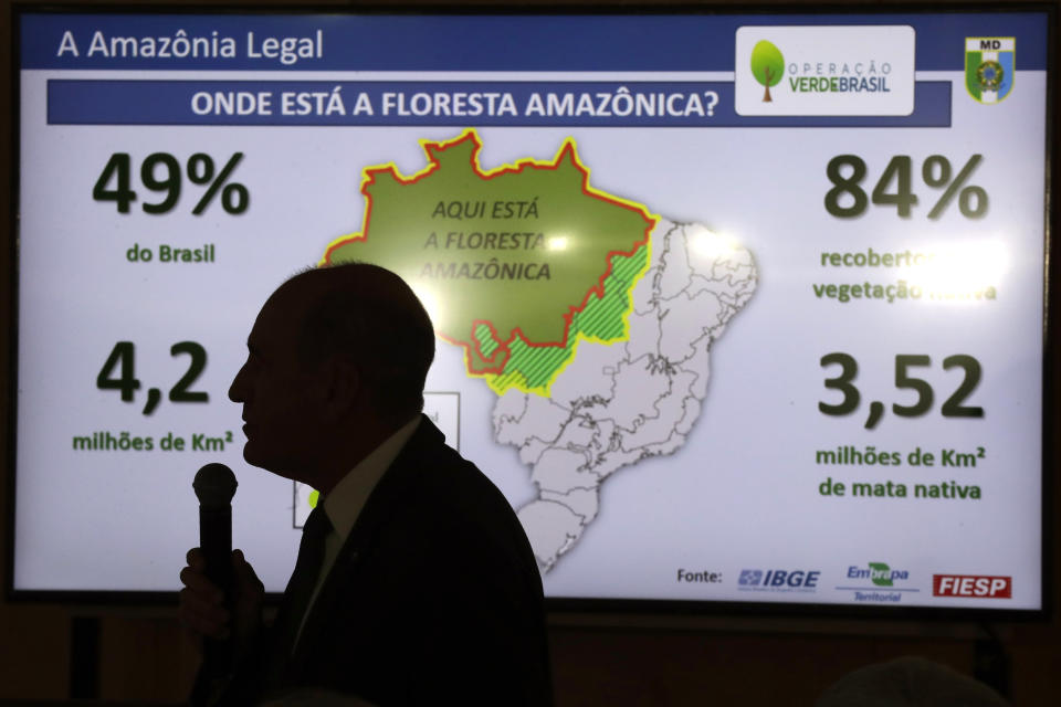 Brazil's Defense Minister Fernando Azevedo speaks during a press conference on the Defense Committee's action in response to the ongoing oil spill on beaches in the northeast region, in Brasilia, Brazil, Tuesday, Oct. 29, 2019. Since the start of September, a mysterious oil spill has sullied almost 250 beaches on Brazil's northeastern coast. According to the Navy, which is overseeing an investigation, its primary hypothesis is that the oil it spilled from a boat navigating off Brazil's shore. (AP Photo/Eraldo Peres)