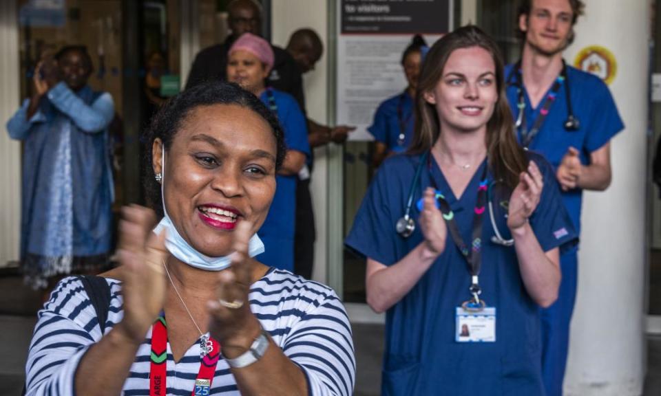 Hospital staff outside the Chelsea and Westminster during the Clap for Carers on 28 May.