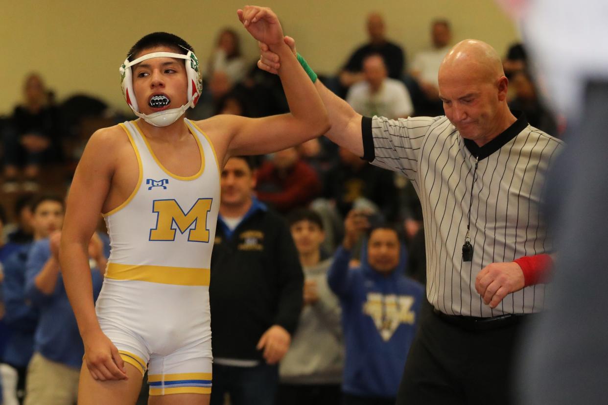 Henry Ramirez from Mahopac defeated Ryan Fitzpatrick from John Jay EF in the 124 pound match during the wrestling divisional at Clarkstown South High School in West Nyack, Feb. 3, 2024.