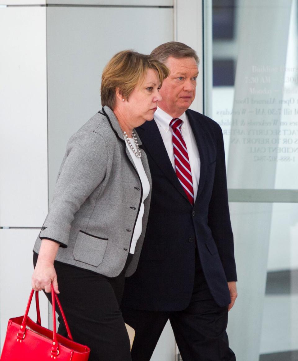 Former Fiesta Bowl executive director John Junker walks out of Sandra Day O'Connor U.S. Courthouse after being sentenced in Phoenix on Thursday, March 13, 2014. Junker was sentenced to eight months in federal prison for participating in a scheme in which bowl employees made illegal campaign contributions to politicians and were reimbursed by the nonprofit bowl. (AP Photo/The Arizona Republic, Michael Schennum) MARICOPA COUNTY OUT; MAGS OUT; NO SALES