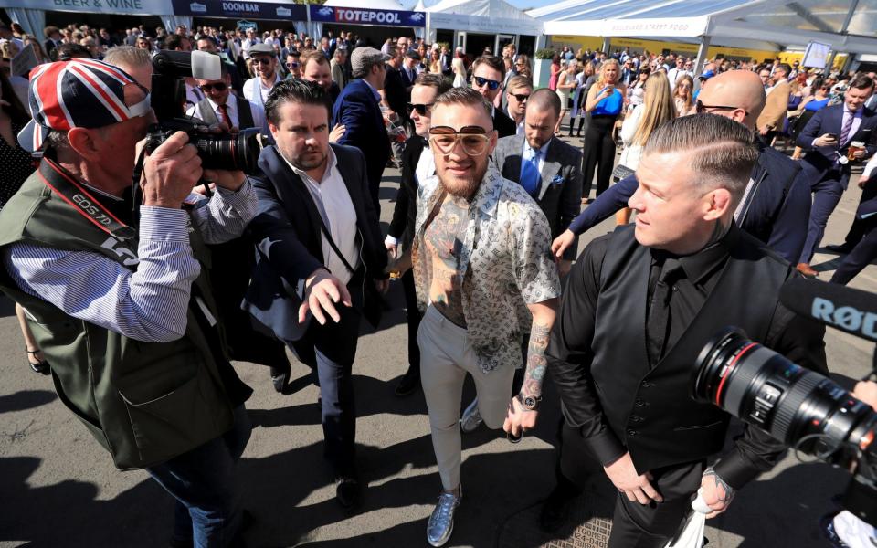 Conor McGregor on Grand National Day of the Randox Health Grand National Festival at Aintree Racecourse. PRESS ASSOCIATION Photo. Picture date: Saturday April 8, 2017. See PA story RACING Aintree. Photo credit should read: Peter Byrne/PA Wire - Credit: Peter Byrne/PA