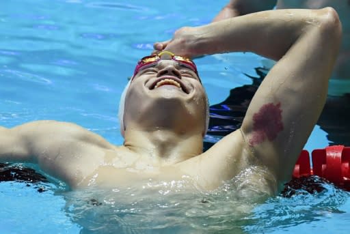 China's Sun Yang reacts after winning the final of the men's 200m freestyle by disqualification at the 2019 World Championships in Gwangju, South Korea