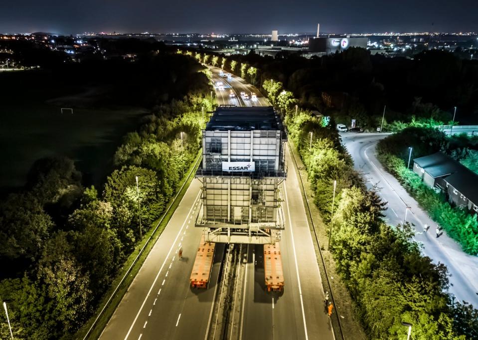 14 August 2022: A part of a £45m furnace straddles the central reservation as it is moved along the M53 which was closed between junction 5 at Hooton and junction 10 for Cheshire Oaks, to accommodate the abnormal load heading to Essar’s Stanlow refinery (PA)