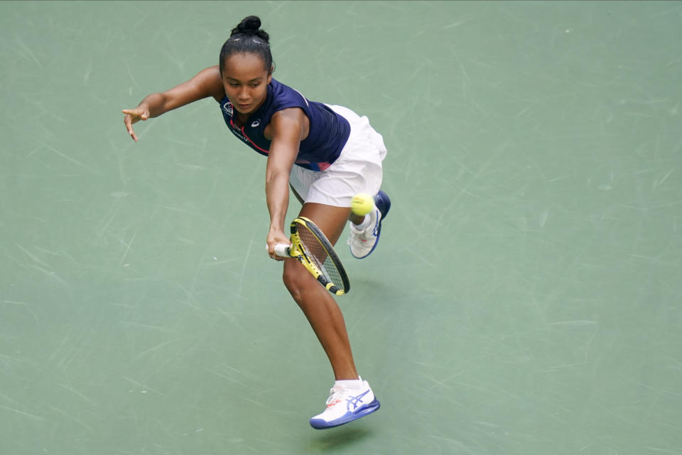 Leylah Fernandez, of Canada, returns a shot to Emma Raducanu, of Britain, during the women's singles final of the US Open tennis championships, Saturday, Sept. 11, 2021, in New York. (AP Photo/Frank Franklin II)