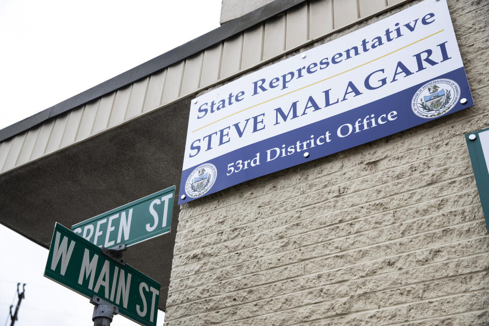 In this April 27, 2020, photo is one of several signs made for Rep. Steve Malagari, posted outside his district office in Lansdale, Pa. The Legislature spent more than $50,000 on signs in 2018-19. The costs varied widely, as did the type of sign. Malagari, a Democrat from Lansdale, hired a sign business on his block to fabricate a main exterior sign, a brushed aluminum “suite marker,” a vinyl sign for the front window and a 2-foot-by-3-foot sandwich board to catch pedestrians. The cost was nearly $1,300. Many of the newly purchased signs were for freshmen like Malagari, but some of last year's sign purchases were by veteran lawmakers. (AP Photo/Matt Rourke)