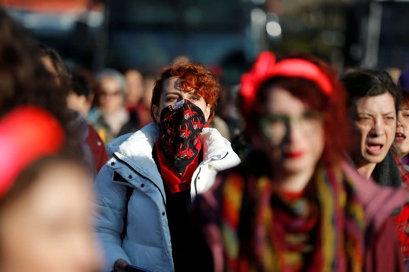 Women perform the Chilean anti-rape song during a demonstration against gender violence in Istanbul,