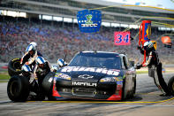 FORT WORTH, TX - NOVEMBER 06: Dale Earnhardt Jr., driver of the #88 National Guard Chevrolet, pits during the NASCAR Sprint Cup Series AAA Texas 500 at Texas Motor Speedway on November 6, 2011 in Fort Worth, Texas. (Photo by Jared C. Tilton/Getty Images for NASCAR)