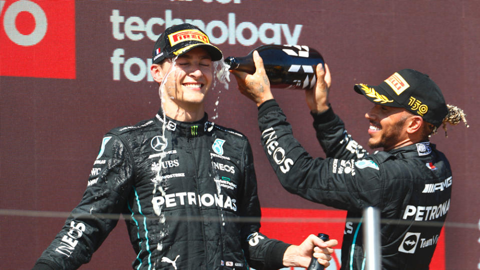 Lewis Hamilton and George Russell enjoy their time together on the podium at the 2022 French Grand Prix.