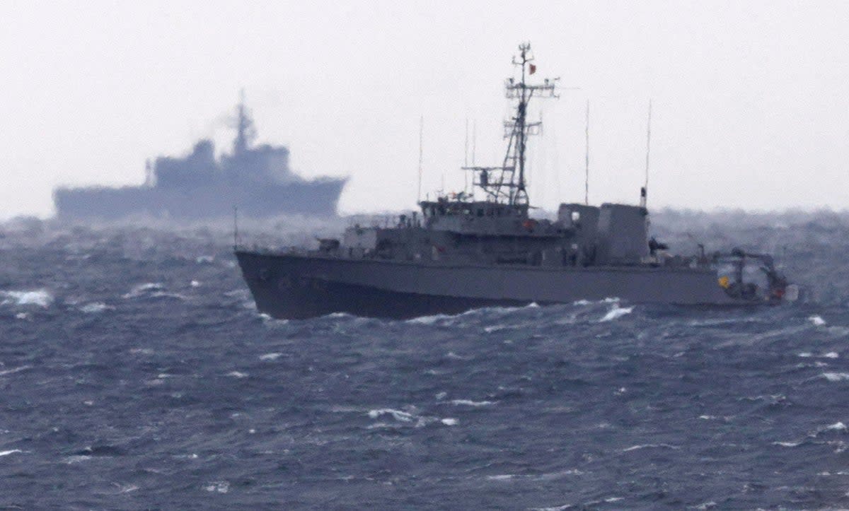 File. A Japanese Maritime Self Defense Force minesweeper searches in the waters where a US military Osprey aircraft crashed, off Yakushima, Kagoshima prefecture, southern Japan, Friday, 1 December 2023. Japan suspended flights by its Osprey aircraft Thursday, officials said, the day after the US Air Force Osprey based in Japan crashed into the sea during a training mission (Kyodo News via AP)