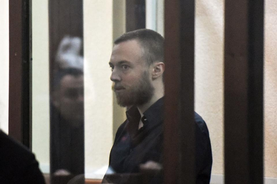 British citizen Jack Shepherd stands inside a defendants' cage during an extradiction hearing at a court in Tbilisi on March 26, 2019. - A Georgian court on March 26, 2019 ruled to extradite a British man who killed his date in a speedboat crash in London and gave himself up in the ex-Soviet republic after fleeing his country. (Photo by Vano Shlamov / AFP)        (Photo credit should read VANO SHLAMOV/AFP/Getty Images)