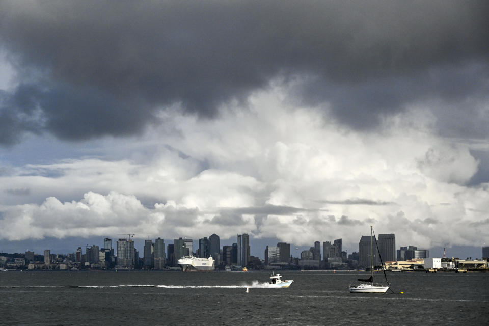 Clouds form over downtown San Diego, Tuesday, Feb. 6, 2024, in San Diego. The National Weather Service issued a tornado warning for parts of East San Diego county. (AP Photo/Denis Poroy)