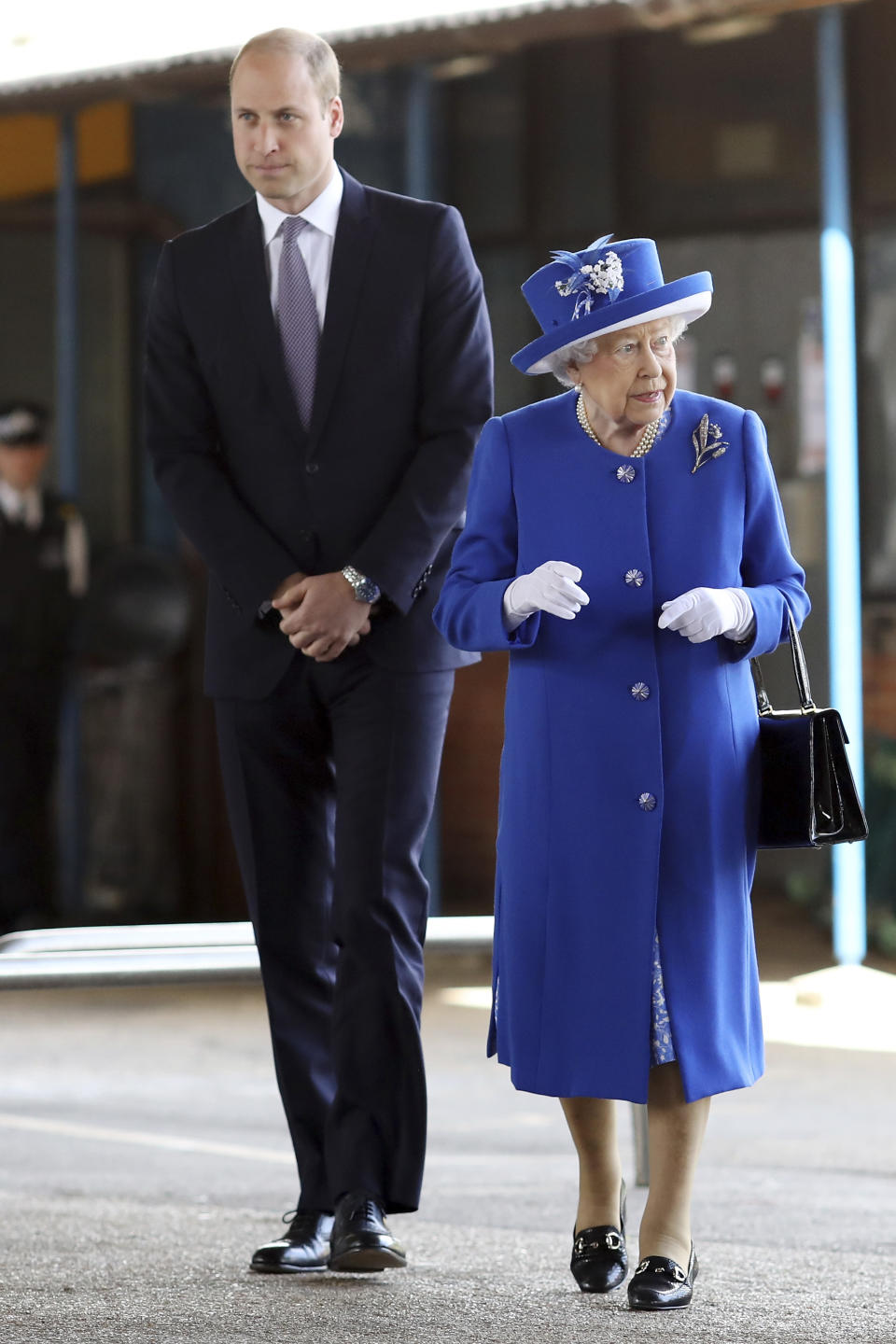 LONDON, ENGLAND - JUNE 16:  Queen Elizabeth II and Prince William, Duke of Cambridge visit the scene of the Grenfell Tower fire on June 16, 2017 in London, England. 17 people have been confirmed dead and dozens still missing, after the 24 storey residential Grenfell Tower block in Latimer Road was engulfed in flames in the early hours of June 14. Emergency services will spend a third day searching through the building for bodies. Police have said that some victims may never be identified.  (Photo by Dan Kitwood/Getty Images)