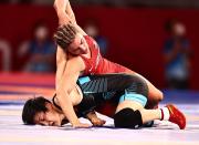 <p>Helen Louise Maroulis of United States competes against Rong Ningning of China during the Women's Freestyle 57kg 1/8 Final on day twelve of the Tokyo 2020 Olympic Games at Makuhari Messe Hall on August 4, 2021 in Chiba, Japan. (Photo by Wang Xianmin/CHINASPORTS/VCG via Getty Images)</p> 