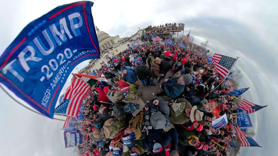 CAPITOL INSURRECTION - A "Trump 2020" flag was over the mob of people packed in outside the Capital in Washington, DC, Wednesday, January 6, 2021.  (Image made with a 360 degree camera)