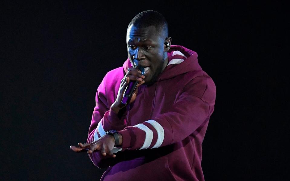 A charity said that the music of Stormzy, a multi-award winning British rapper, is more relevant to schoolchildren than Mozart - AFP