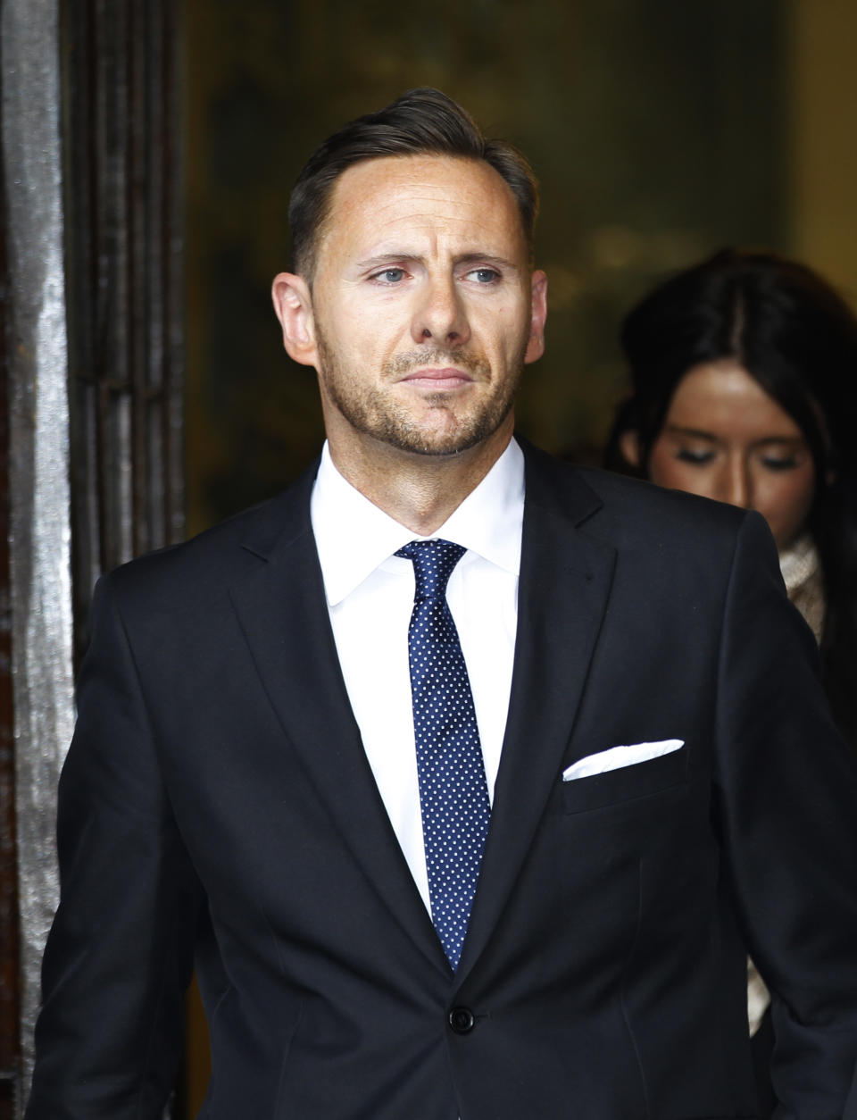 Private investigator Glenn Mulcaire leaves Britain's Supreme Court in central London, Tuesday, May 8, 2012. Mulcaire, jailed for hacking phones for Rupert Murdoch's News of the World asked Britain's Supreme Court on Tuesday to back his bid to keep mum about who ordered him to conduct the illegal eavesdropping. (AP Photo/Lefteris Pitarakis)