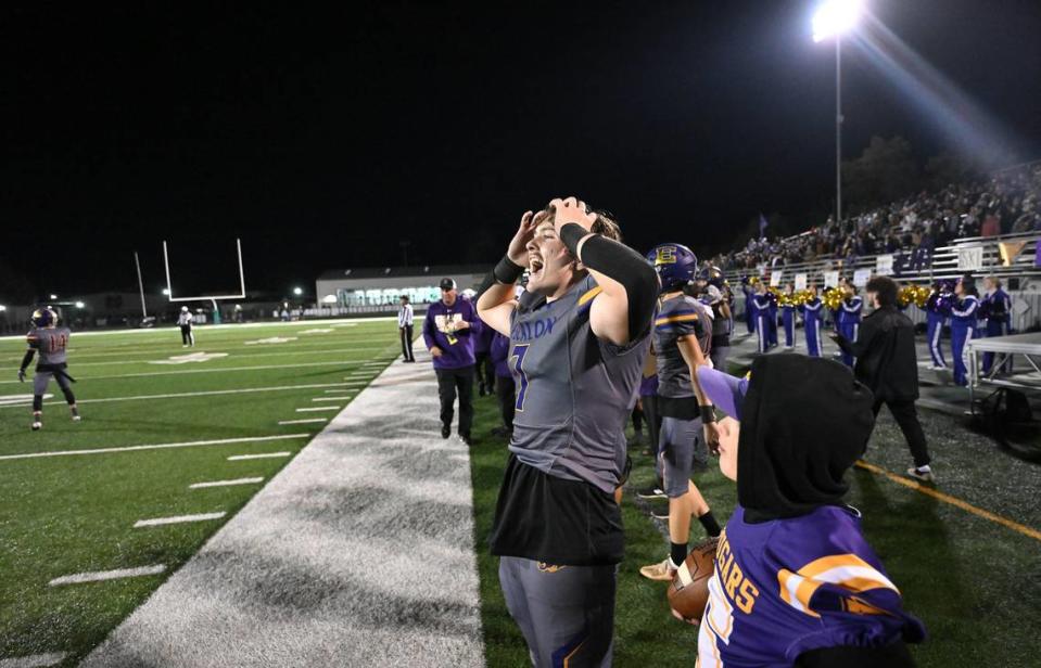 Escalon quarterback Donovan Rozevink calls out to his teammates on defense during the Sac-Joaquin Section Division IV championship game with Patterson at St. Mary’s High School in Stockton, Calif., Friday, Nov. 24, 2023.