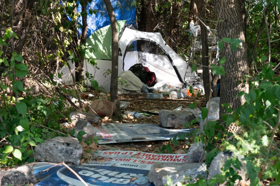 A campsite where 5-year-old Zoey Felix lived remains in place Monday afternoon in a wooded area just north of Dillons at 2010 S.E. 29th St.