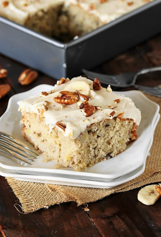 <p>The Kitchen is my Playground</p><p>What we've got here is all the hummingbird deliciousness of the classic layer cake (banana, pineapple, cream cheese frosting, pecans) loaded on a low-fuss sheet cake. </p><p><strong>Get the recipe:</strong> <a href="https://www.thekitchenismyplayground.com/2017/09/hummingbird-sheet-cake.html" rel="nofollow noopener" target="_blank" data-ylk="slk:Hummingbird Sheet Cake;elm:context_link;itc:0;sec:content-canvas" class="link rapid-noclick-resp"><strong>Hummingbird Sheet Cake</strong></a></p>