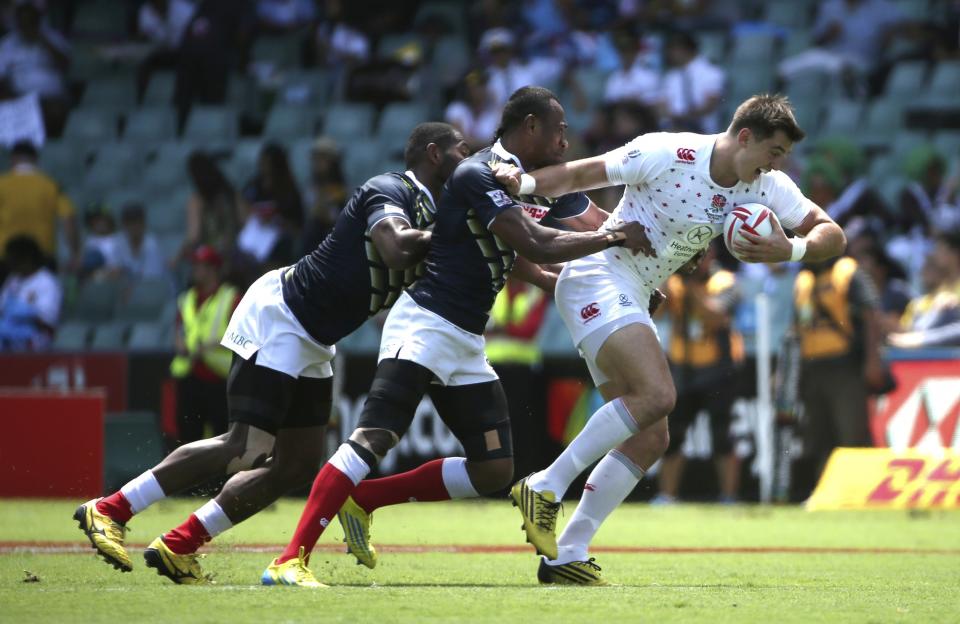 Former England rugby union standout Alex Gray, right, is trying his hand at the NFL with the Atlanta Falcons. (AP)