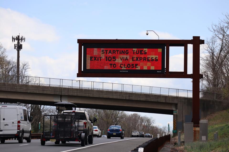 A sign on the Garden State Parkway informs motorists that the Express lane ramp at Exit 105 will close starting April 19, 2022.