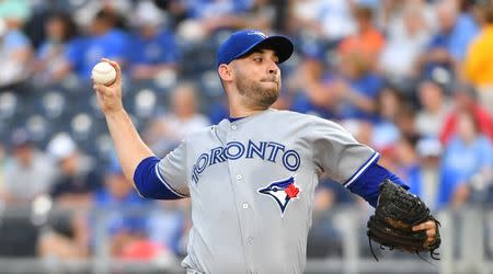 Aug 15, 2018; Kansas City, MO, USA; Toronto Blue Jays starting pitcher Marco Estrada (25) delivers a pitch in the first inning against the Kansas City Royals at Kauffman Stadium. Mandatory Credit: Denny Medley-USA TODAY Sports