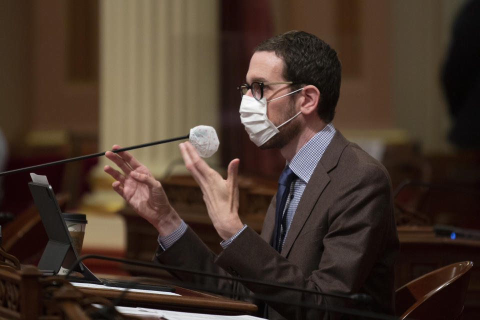 State Sen. Scott Wiener, D-San Francisco, questions Corrections Secretary Ralph Diaz, about the coronavirus outbreak at San Quentin State Prison during a Senate oversight hearing in Sacramento, Calif., Wednesday, July 1, 2020. Lawmakers criticized state corrections officials for inadvertently transferring infected inmates from a Southern California prison to San Quentin, near San Francisco, triggering the state's worst prison coronavirus outbreak. (AP Photo/Rich Pedroncelli)