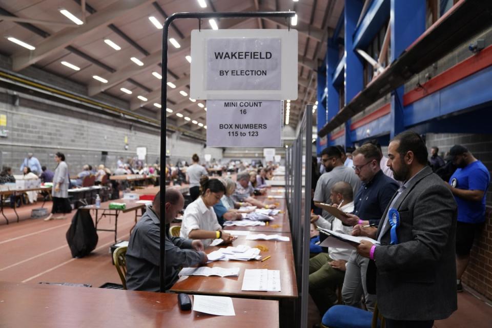 Party officials observe the count at Thornes Park Stadium in Wakefield (Danny Lawson/PA) (PA Wire)