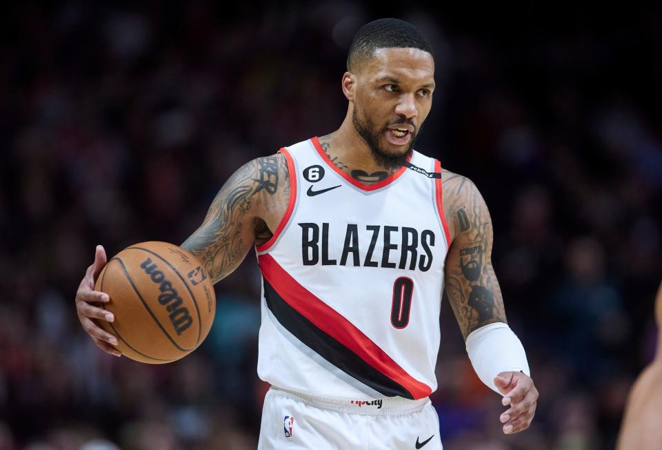 Portland Trail Blazers guard Damian Lillard brings the ball up against the New York Knicks during the second half of an NBA basketball game in Portland on March 14, 2023. Damian Lillard asked his team for a trade on July 1.