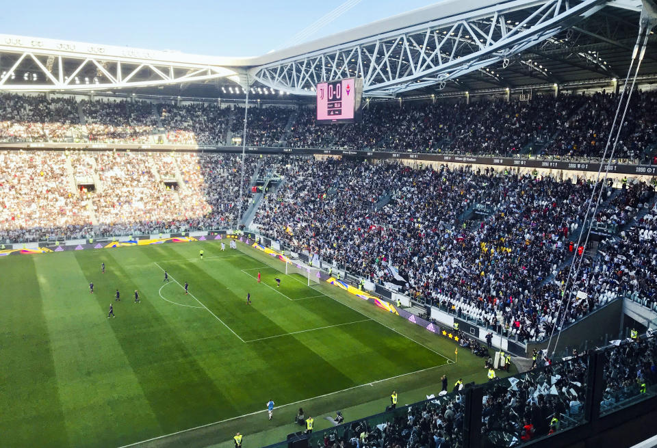 In this Sunday, March 24 2019 photo, spectators watch the Italian league women’s match between Juventus Women and Fiorentina Women in the Allianz Arena in Turin, Italy. The exceptional growth of women’s soccer took another leap forward when 39,000 people packed into the Allianz Stadium to watch Juventus Women beat Fiorentina Women 1-0 on a sunny Sunday afternoon. That was a record attendance in Italy that far eclipsed the old mark of 14,000. (AP Photo/Daniella Matar)