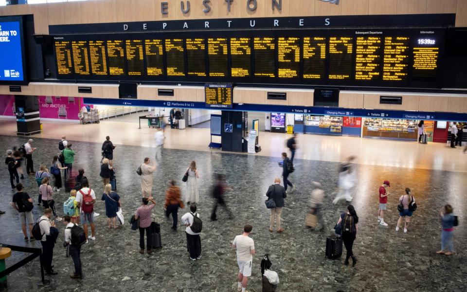 Euston station on Wednesday. Rail services will be severely impacted today - EPA
