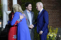 President Joe Biden and first lady Jill Biden are greeted by Canadian Prime Minister Justin Trudeau and his wife Sophie Gregoire Trudeau at Rideau Cottage, Thursday, March 23, 2023, in Ottawa, Canada. (AP Photo/Andrew Harnik)